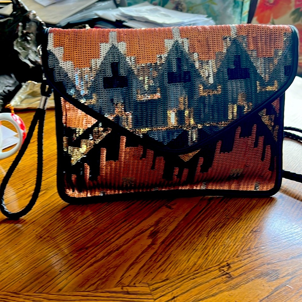 NWOT Crazy Lou Paris clutch/crossbody/shoulder handbag. Sequin multicolored.chic
